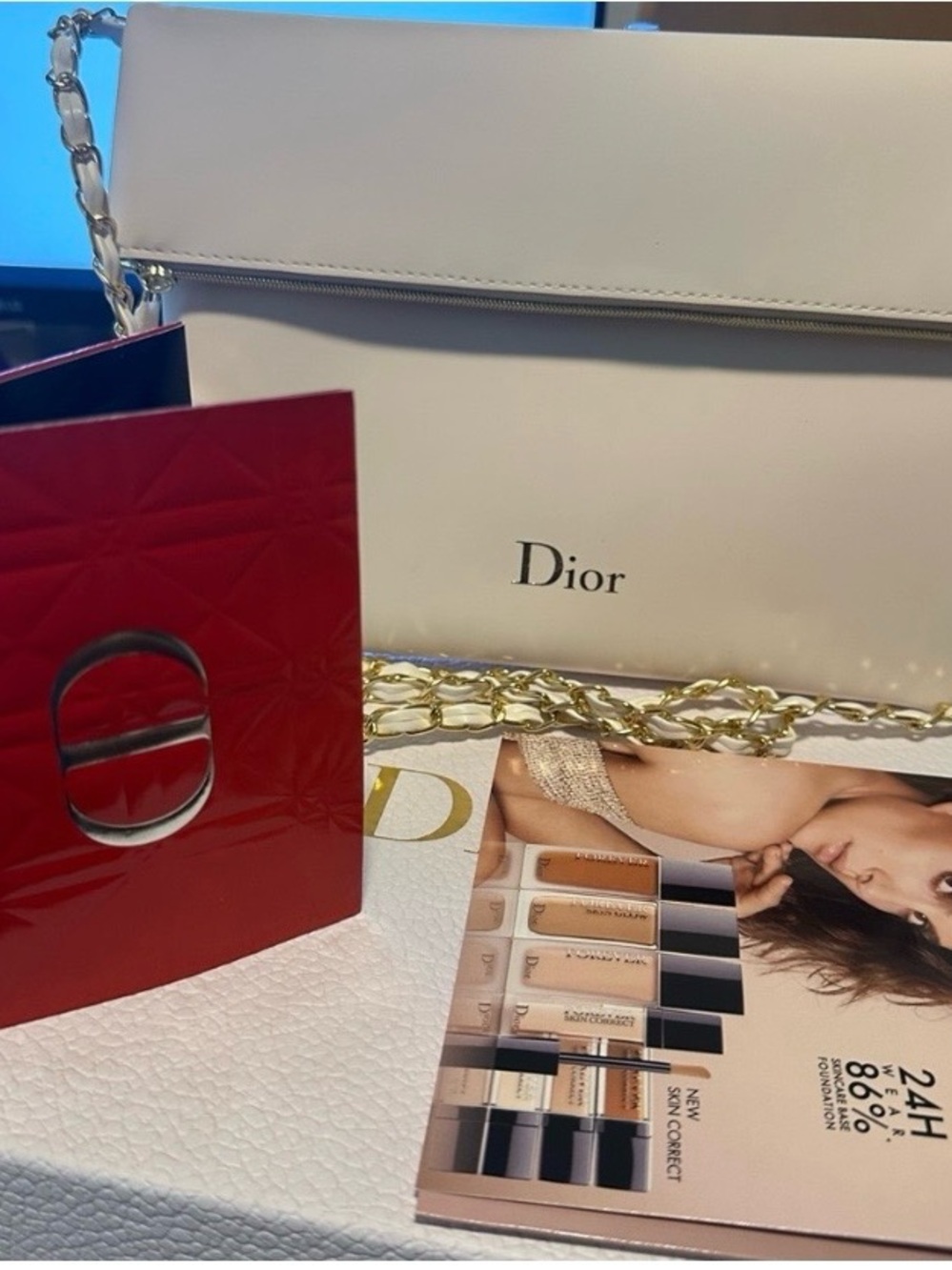Dior White Leather Shoulder Bag with Gold Chain makeup pouch & makeup samples.